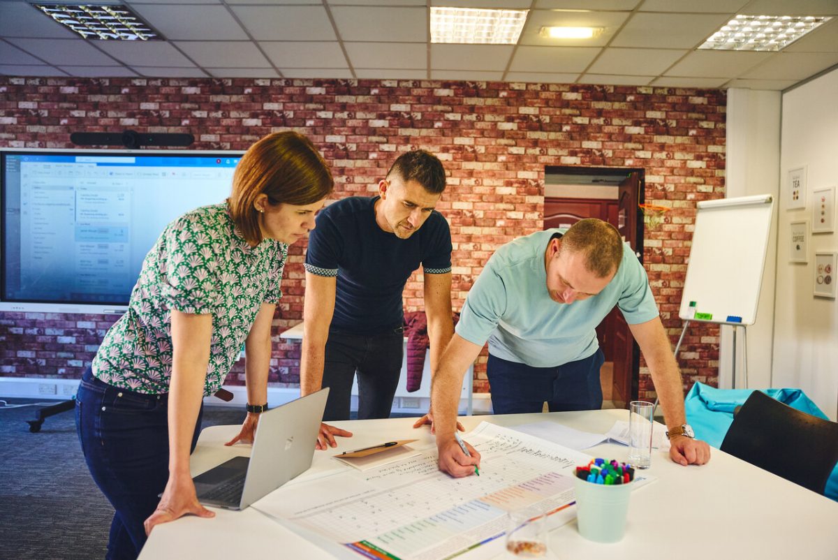 Fitness professional analysing branding elements to stand out in the 2026 industry.